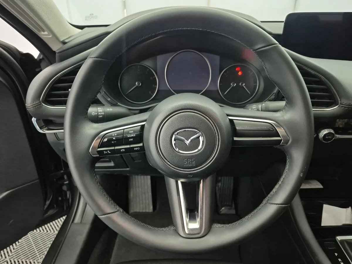 Mazda 3 — tablero